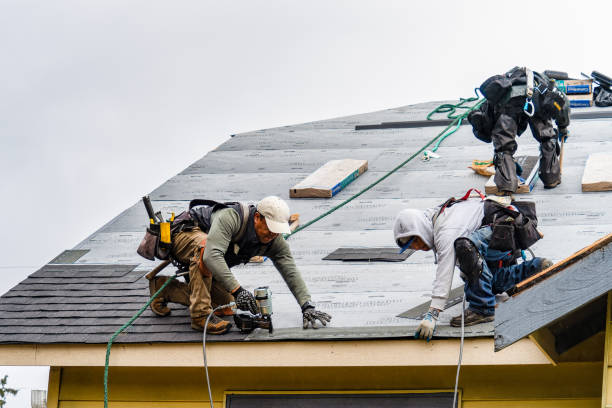 Professional Gutter Installation technician working in Riverside, MO
